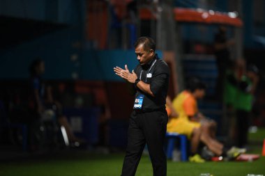 Bangkok-Thailand- 13 Jul 2019:Sasom popprasert head coach of Chonburi fc in action during thaileague match between port fc against Chonburi fc at pat stadium, Thailand