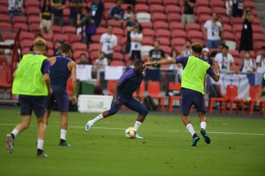 Kallang-singapore-19jul2019-Tanguy ndombele player of tottenham hotspur in action during official training before icc2019 at national stadium,singapore