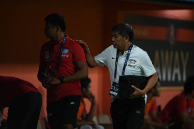 Bangkok-Thailand- 13 Jul 2019: Wittaya laohakul Staff coach of Chonburi fc in action during thaileague match between port fc against Chonburi fc at pat stadium, Thailand