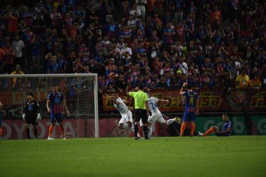 Bangkok-Thailand-13 Jul 2019: Herlison caion de souza ferreira player of Chonburi fc congratulation for goal during thaileague match between port fc against Chonburi fc at pat stadium, Thailand