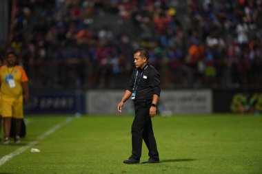 Bangkok-Thailand- 13 Jul 2019:Sasom popprasert head coach of Chonburi fc in action during thaileague match between port fc against Chonburi fc at pat stadium, Thailand