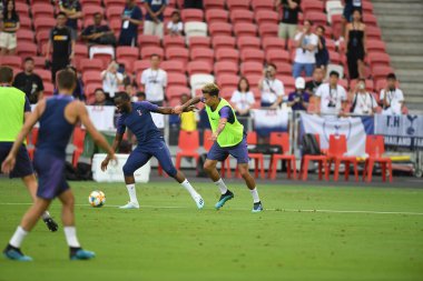 Kallang-singapore-19jul2019-Dele alli player of tottenham hotspur in action during official training before icc2019 at national stadium,singapore