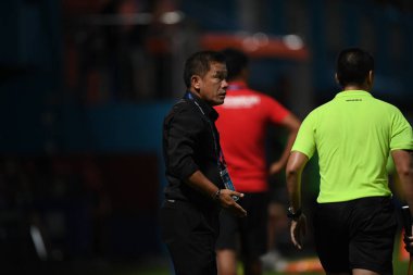 Bangkok-Thailand- 13 Jul 2019:Sasom popprasert head coach of Chonburi fc in action during thaileague match between port fc against Chonburi fc at pat stadium, Thailand