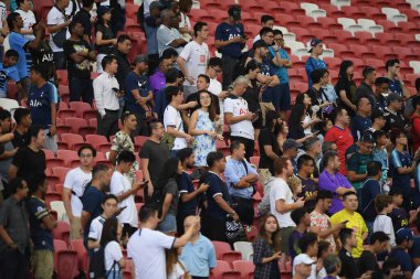 Kallang-singapore-19jul2019-Unidentified fan of tottenham hotspur in action during official training before icc2019 at national stadium,singapore