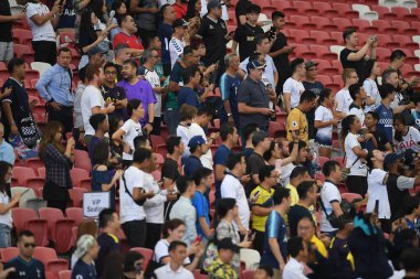 Kallang-singapore-19jul2019-Unidentified fan of tottenham hotspur in action during official training before icc2019 at national stadium,singapore