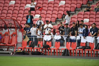 Kallang-singapore-19jul2019-Unidentified fan of tottenham hotspur in action during official training before icc2019 at national stadium,singapore