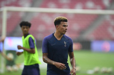 Kallang-singapore-19jul2019-Dele alli player of tottenham hotspur in action during official training before icc2019 at national stadium,singapore