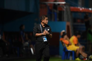 Bangkok-Thailand- 13 Jul 2019:Sasom popprasert head coach of Chonburi fc in action during thaileague match between port fc against Chonburi fc at pat stadium, Thailand
