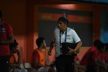 Bangkok-Thailand- 13 Jul 2019: Wittaya laohakul Staff coach of Chonburi fc in action during thaileague match between port fc against Chonburi fc at pat stadium, Thailand