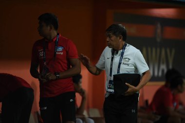 Bangkok-Thailand- 13 Jul 2019: Wittaya laohakul Staff coach of Chonburi fc in action during thaileague match between port fc against Chonburi fc at pat stadium, Thailand