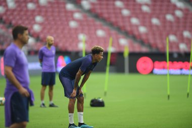 Kallang-singapore-19jul2019-Dele alli player of tottenham hotspur in action during official training before icc2019 at national stadium,singapore
