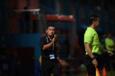 Bangkok-Thailand- 13 Jul 2019:Sasom popprasert head coach of Chonburi fc in action during thaileague match between port fc against Chonburi fc at pat stadium, Thailand