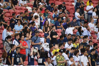Kallang-singapore-19jul2019-Unidentified fan of tottenham hotspur in action during official training before icc2019 at national stadium,singapore