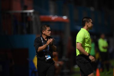 Bangkok-Thailand- 13 Jul 2019:Sasom popprasert head coach of Chonburi fc in action during thaileague match between port fc against Chonburi fc at pat stadium, Thailand