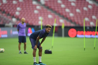 Kallang-singapore-19jul2019-Dele alli player of tottenham hotspur in action during official training before icc2019 at national stadium,singapore