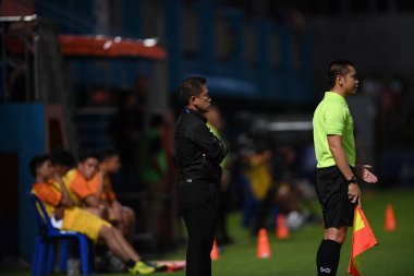 Bangkok-Thailand- 13 Jul 2019:Sasom popprasert head coach of Chonburi fc in action during thaileague match between port fc against Chonburi fc at pat stadium, Thailand
