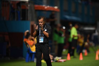 Bangkok-Thailand- 13 Jul 2019:Sasom popprasert head coach of Chonburi fc in action during thaileague match between port fc against Chonburi fc at pat stadium, Thailand