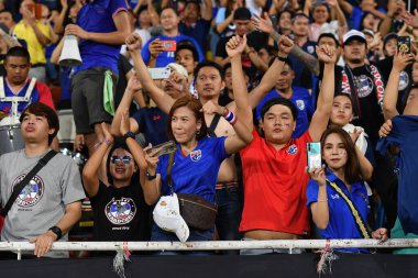Bangkok-thailand- 15 oct 2019 :Unidentified fan of Thailand in action during FIFA world cup qatar 2022 against UAE at thammasart stadium, Thailand 