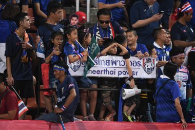 Bangkok-thailand- 15 oct 2019 :Unidentified fan of Thailand in action during FIFA world cup qatar 2022 against UAE at thammasart stadium, Thailand 