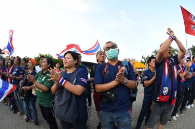 Bangkok-thailand- 15 oct 2019 :Unidentified fan of Thailand in action during FIFA world cup qatar 2022 against UAE at thammasart stadium, Thailand 