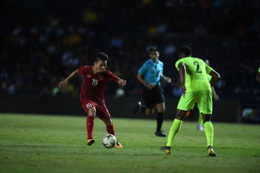 Buriram, Tayland - 8 Haziran 2019: Nguyn Quang Hi # 19 Kings Cup final karşılaşmasında Curacao 'ya karşı Chang Arena, Buriram, Tayland