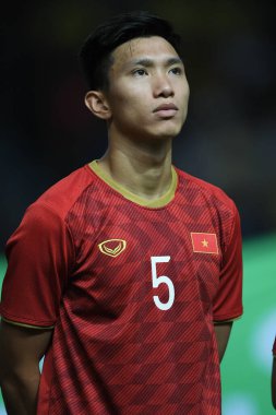 Buriram, Tayland - 8 Haziran 2019: Vn Hu # 5 Vietnam 'da Kings Cup final maçı sırasında Chang Arena, Buriram, Tayland' da Curacao 'ya karşı