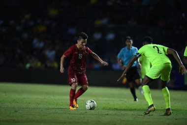Buriram, Tayland - 8 Haziran 2019: Nguyn Quang Hi # 19 Kings Cup final karşılaşmasında Curacao 'ya karşı Chang Arena, Buriram, Tayland