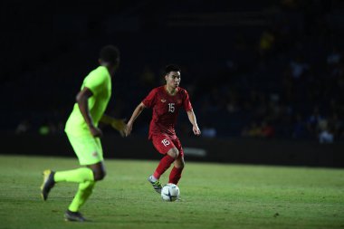 Buriram, Tayland - 8 Haziran 2019: Phm c Huy # 15 Vietnam Oyuncusu Kings Cup final maçı sırasında Chang Arena, Buriram, Tayland 'da Curacao' ya karşı