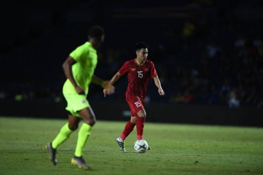 Buriram, Tayland - 8 Haziran 2019: Phm c Huy # 15 Vietnam Oyuncusu Kings Cup final maçı sırasında Chang Arena, Buriram, Tayland 'da Curacao' ya karşı