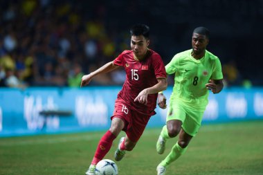 Buriram, Tayland - 8 Haziran 2019: Phm c Huy # 15 Vietnam Oyuncusu Kings Cup final maçı sırasında Chang Arena, Buriram, Tayland 'da Curacao' ya karşı
