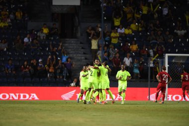Buriram, Tayland - 8 Haziran 2019: Curacao oyuncuları Chang Arena, Buriram, Tayland 'da oynanan Kings Cup final maçında gol atmayı kutluyorlar