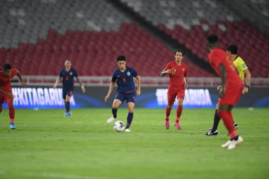 Jakarta, Endonezya - 10 Eylül 2019: Manuel Tom Bihr # 14 Tayland Oyuncusu 2020 Dünya Kupası elemeleri sırasında Endonezya 0-3 Tayland maçı sırasında Gelora Bung Karno Stadyumu, Endonezya