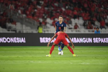 Jakarta, Endonezya - 10 Eylül 2019: Tristan Do # 19 Tayland Oyuncusu 2020 Dünya Kupası elemeleri sırasında Endonezya 0-3 Tayland maçı sırasında Gelora Bung Karno Stadyumu, Endonezya