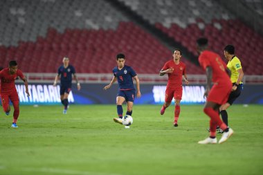 Jakarta, Endonezya - 10 Eylül 2019: Manuel Tom Bihr # 14 Tayland Oyuncusu 2020 Dünya Kupası elemeleri sırasında Endonezya 0-3 Tayland maçı sırasında Gelora Bung Karno Stadyumu, Endonezya
