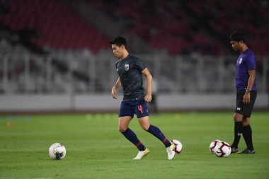 Jakarta, Endonezya - 10 Eylül 2019: Manuel Tom Bihr # 14 Tayland Oyuncusu 2020 Dünya Kupası elemeleri sırasında Endonezya 0-3 Tayland maçı sırasında Gelora Bung Karno Stadyumu, Endonezya