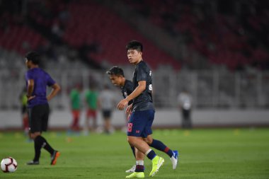 Jakarta, Endonezya - 10 Eylül 2019: Ekanit Panya # 18 Tayland Oyuncusu, Endonezya 'nın Gelora Bung Karno Stadyumu' nda oynanan 2020 Dünya Kupası eleme karşılaşmasında