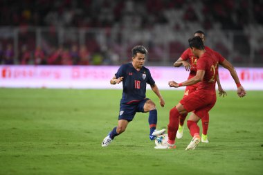 Jakarta Endonesia10 sep 2019: Chanathip şarkı sözü # 10 Tayland 'da 2020 Dünya Kupası elemeleri sırasında Dünya Kupası elemeleri sırasında Gelora Bung Karno Stadyumu' nda oynanmıştır. 