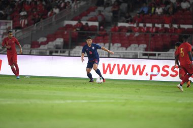 Jakarta Endonezya 10 sep 2019: Phitiwat sukjitthammakul # 16 Tayland futbolcusu 2020 Dünya Kupası elemeleri sırasında Endonezya 0-3 Tayland 'da Gelora bung karno stadyumunda 
