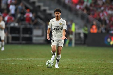Kallang-Singapur-28 Temmuz 2018: Alexandre Fressange # 43 PSG oyuncusu, 2018 yılında, Singapur 'daki Paris Saint-Almanya Stadyumu' ndaki cephaneliğe karşı savaşıyor. 