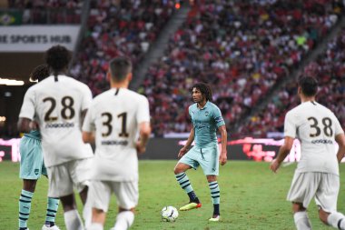 Kallang-Singapur-28 Temmuz 2018: Muhammed Elneny # 4 Cephanelik Oyuncusu Buz 2018 'de, Singapur' daki Paris Saint-Almanya Stadyumu 'ndaki cephaneliğe karşı savaşıyor.