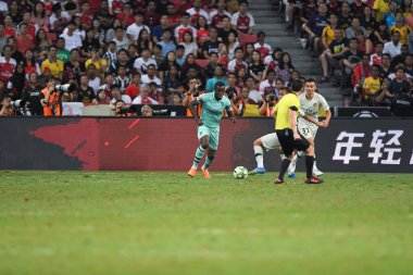 Kallang-Singapur-28 Temmuz 2018: Eddie nketiah # 49 cephanelik oyuncusu icc2018 'de Paris Saint-Almanya' daki ulusal stadyumdaki cephaneliğe karşı savaşıyor.