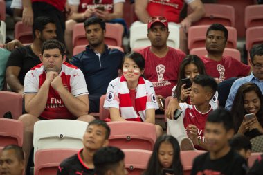 Kallang-Singapur-26 Haziran 2018: Singapur Milli Stadyumu 'ndaki Atletico de Madrid' e karşı C2018 sırasında kimliği belirsiz taraftarlar çatışmaya girdi