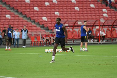 KALLANG, SINGAPORE - 19 Temmuz 2019: Paul Pogba # 6 MANCHESTER UTD Milli Stadyum, Singapur 'da antrenman yaparken