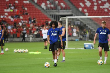 KALLANG, ŞARKI - 19 Temmuz 2019: 44 numaralı Manchester UTD oyuncusu Singapur 'daki ulusal stadyumdaki antrenman sırasında görev başında.