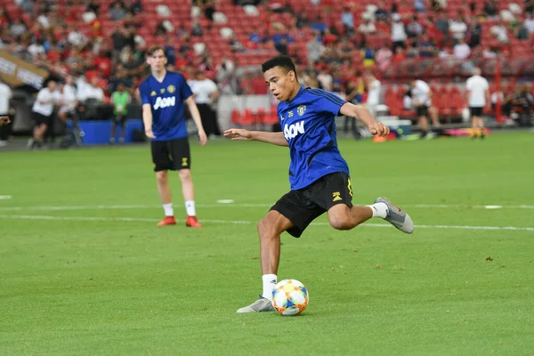 KALLANG, SINGAPORE - 19 Temmuz 2019: 26 numaralı Mason Greenwood Milli Stadyum, Singapur 'daki antrenman sırasında görev başında.