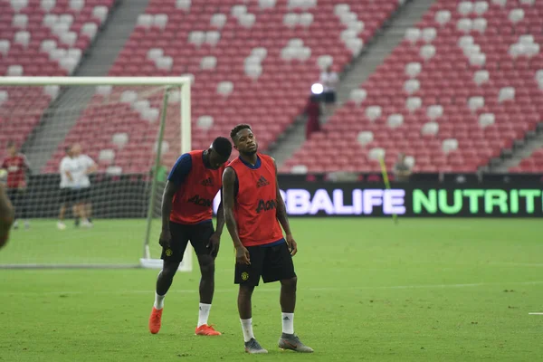 KALLANG, ŞARKI - 19 Temmuz 2019: MANCHESTER UTD 'den Fred Player Singapur' daki ulusal stadyumdaki antrenman sırasında görev başında