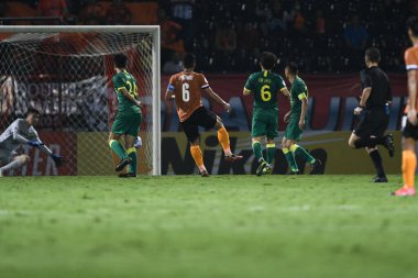 Chiangrai-Tayland-FEB 18, 2020: PHITIWAT SOOKJITTHAMMAKUL # 6 chiangrai utd in action during afc 2020 between chiangrai utd against Beijing guoan fc at United stadium, chiangrai, thailand
