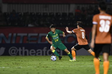 Chiangrai-Tayland-FEB 18, 2020: YANG FAN # 24 Beijing guoan oyuncusu 2020 yılında Beijing guoan utd ile Beijing guoan fc arasında Birleşik Stadyumu, Chiangrai, Tayland