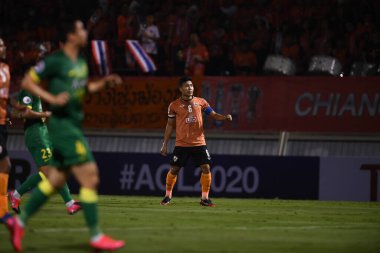 Chiangrai-Tayland-FEB 18, 2020: PHITIWAT SOOKJITTHAMMAKUL # 6 chiangrai utd in action during afc 2020 between chiangrai utd against Beijing guoan fc at United stadium, chiangrai, thailand