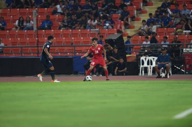 Bangkok-Tayland-9 Ocak 2020: Adnan fawaz # 18 bahreyn oyuncusu Tayland ile Tayland arasındaki 2020 şampiyonası sırasında Tayland rajamankala Stadyumu, Tayland